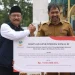 Mensos Serahkan Bantuan Rp9 Miliar untuk Korban Banjir Aceh