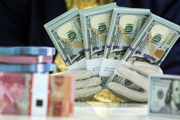 Rupiah Ditutup Melemah, Investor Cermati Kebijakan AS